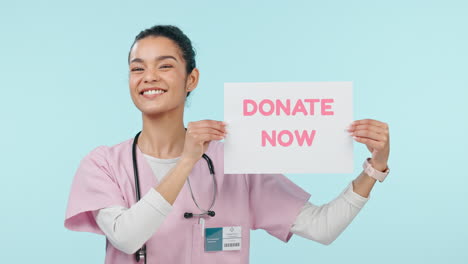 Donate,-sign-and-face-of-woman-with-nurse-smile