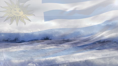 digital composition of waving uruguay flag against waves in the sea