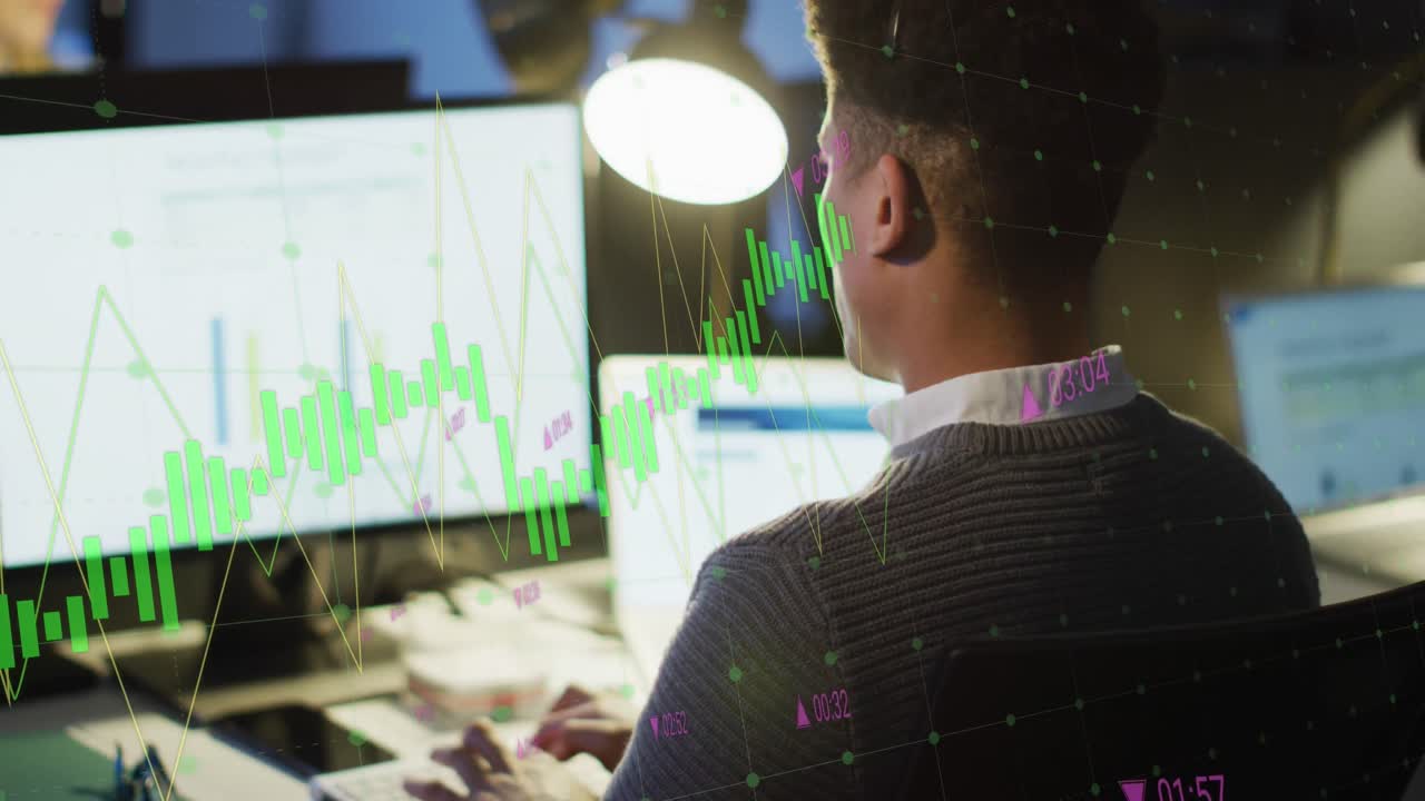Animation of financial data processing over biracial businessman working in office