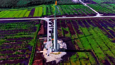 Drone view of chimneys in construction at a wild park during daytime