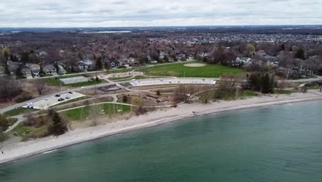 Drone-circling-over-beach-in-the-winter-in-Ajax