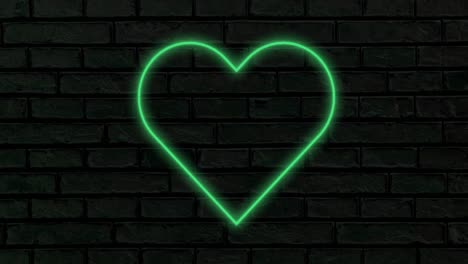 animation of green neon heart flashing on a black background