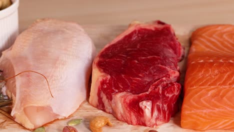 variety of meats, nuts, and dairy displayed together