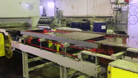 automated stone or tile conveyor system in a manufacturing facility