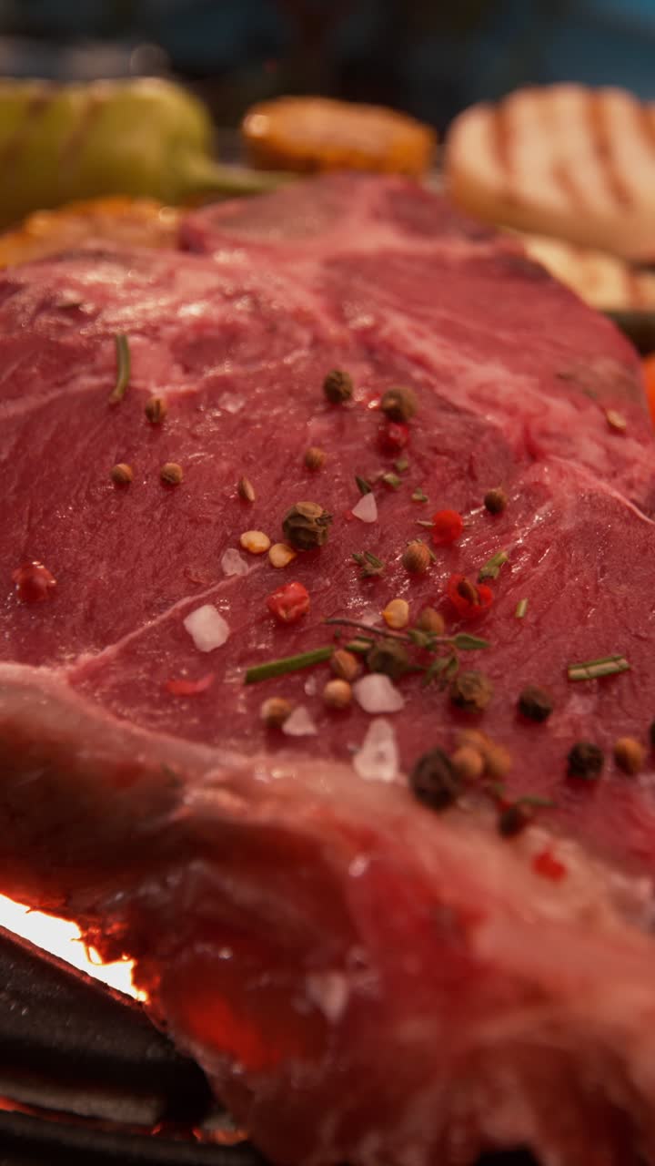 Close-up of steak being prepared on a grill