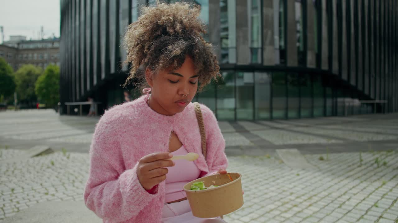 Woman Eating Salad on the Street