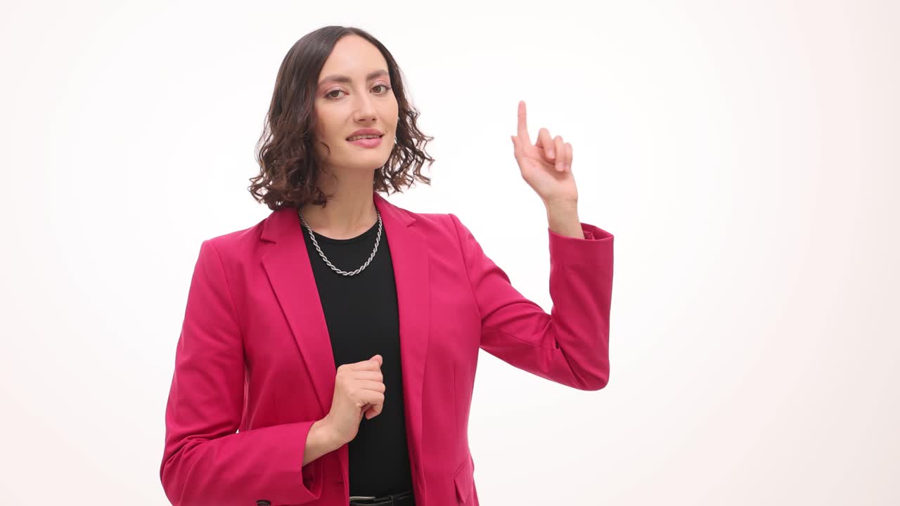 Professional Woman in Pink Blazer Gesturing and Pointing