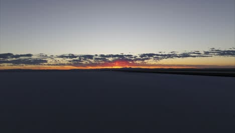 aerial drone view of salt flats landscape at sunset, bonneville in utah