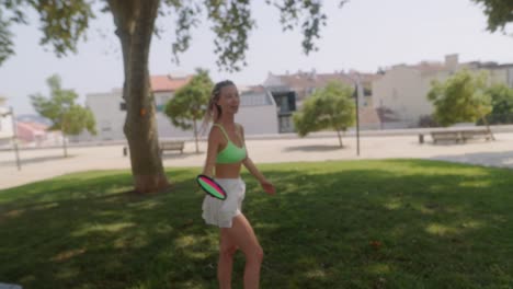 Woman playing frisbee in the park