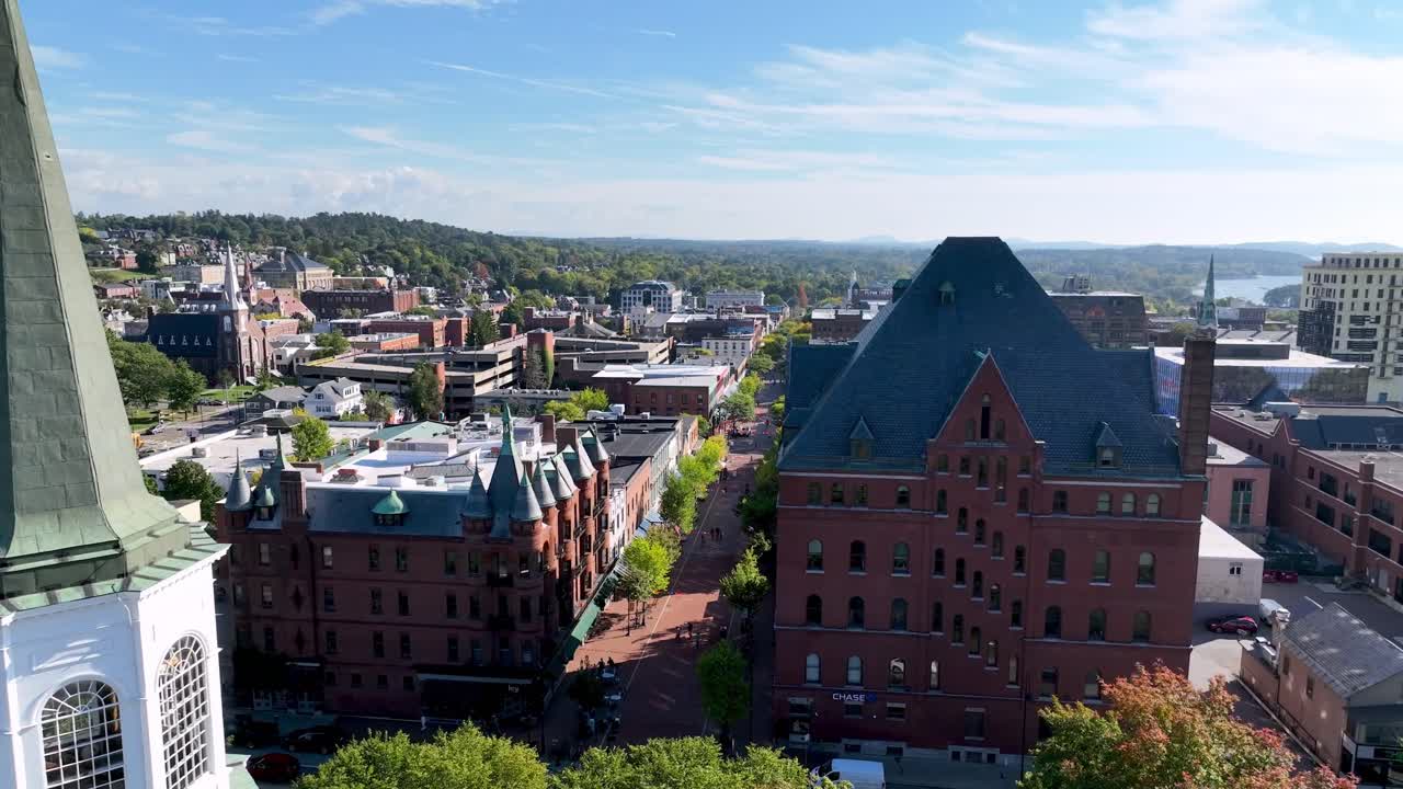 aerial push in over shopping district in burlington vermont