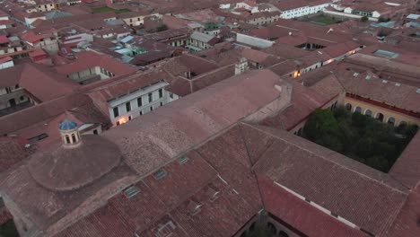 daytime 4k drone aerial footage over spanish colonial houses from the center of cusco city, peru during coronavirus lockdown