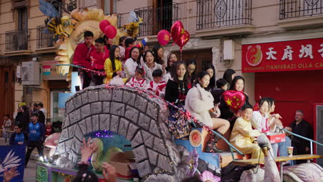 chinese new year parade float with people