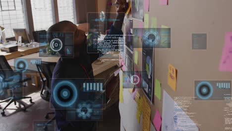 animation of data processing over african american businessman in office