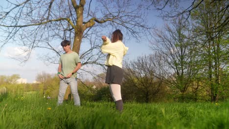 young people playing in a park