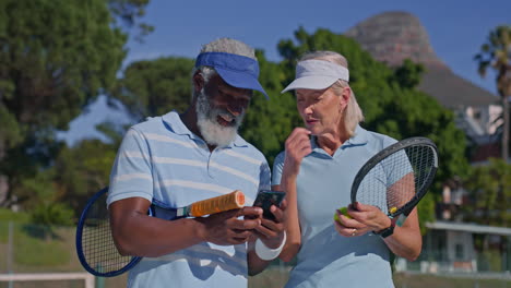 Senior Couple Enjoying Tennis and Using Smartphone