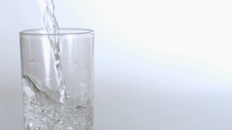 glass being filled in super slow motion