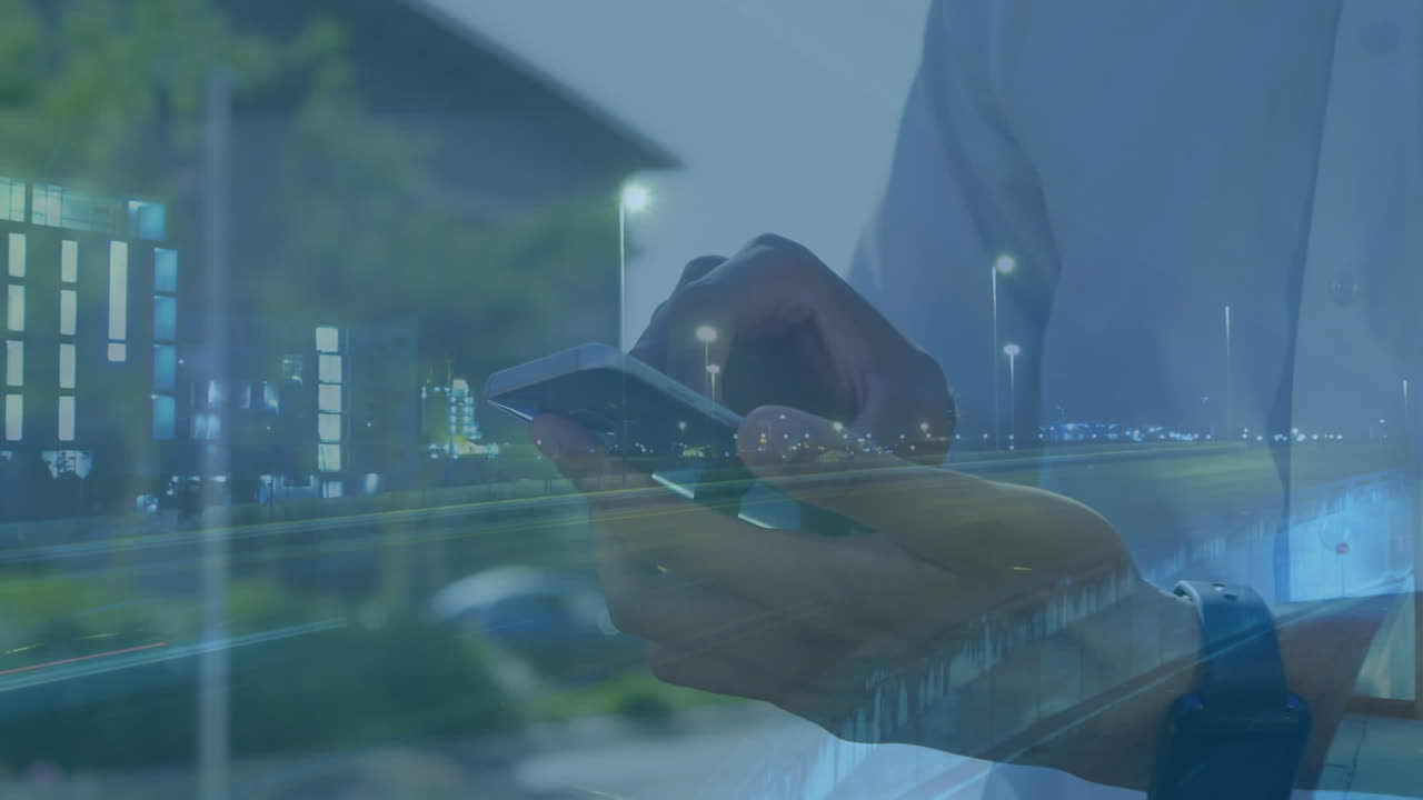 Animation of man using smartphone over cityscape