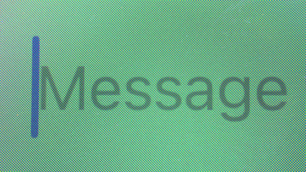 Blinking Cursor Next to Message Text on Digital Screen