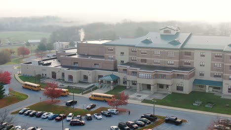 foggy, misty hazy morning at school building