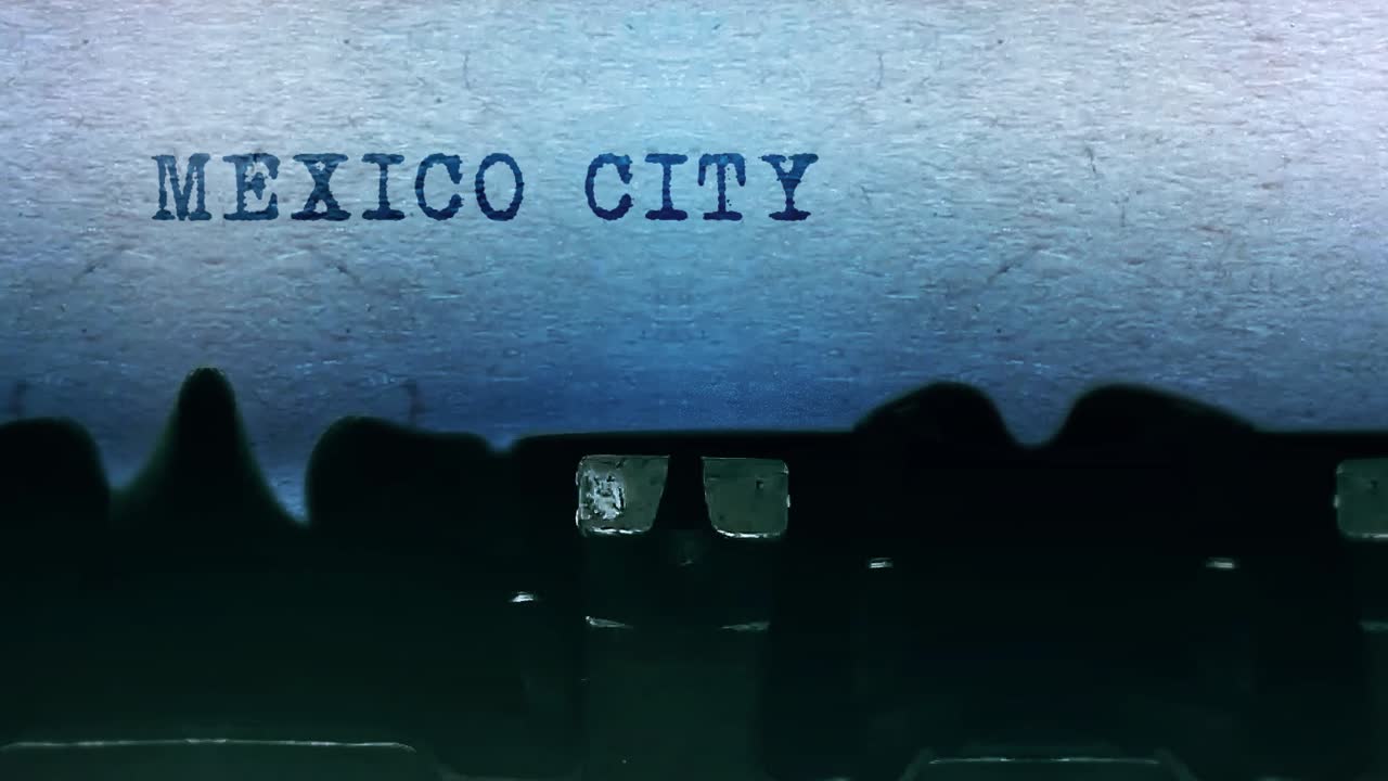 Mexico city words typing on a sheet of paper with an old vintage typewriter