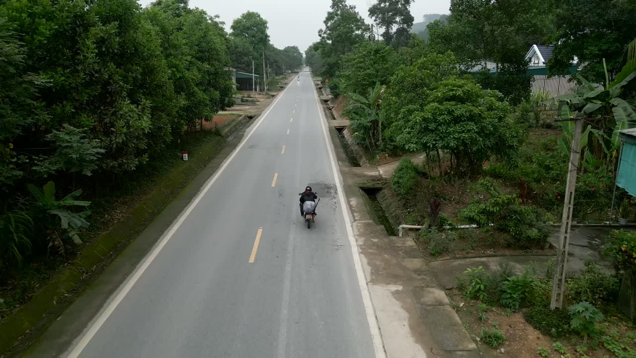 Rural Road Scene with Motorbike