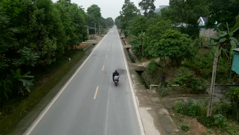 rural road scene with motorbike