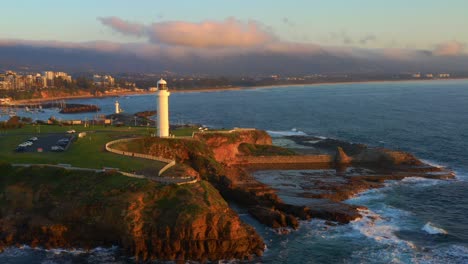 flagstaff hill lighthouse - aerial view of wollongong head lighthouse at sunset in wollongong, nsw, australia