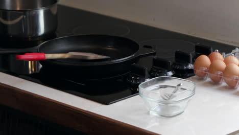 cooking utensils for meal with eggs as main ingredient