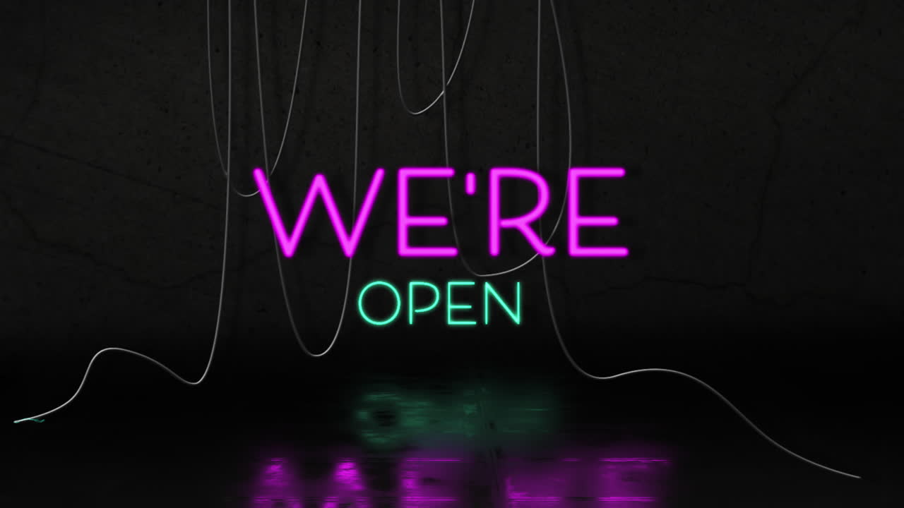 Animation of we're open text in pink and blue neon, with hanging cables on black background