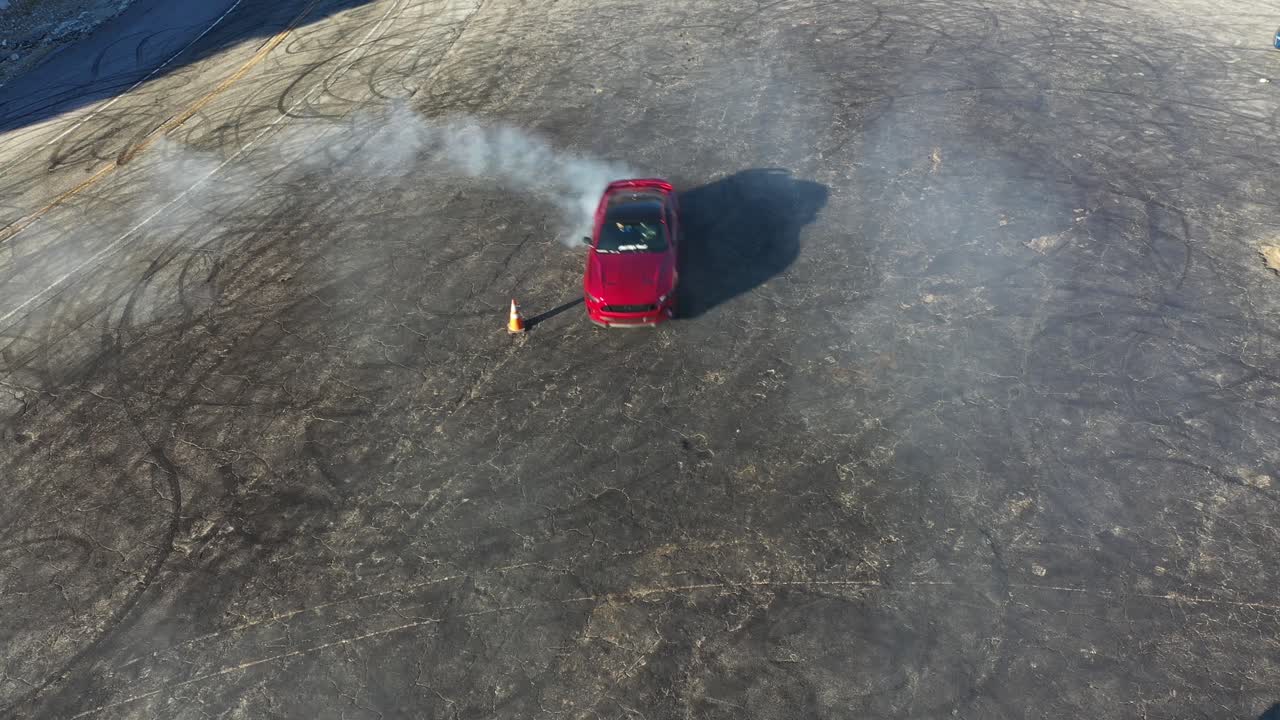 Red Sports Car Drifting on Asphalt Track