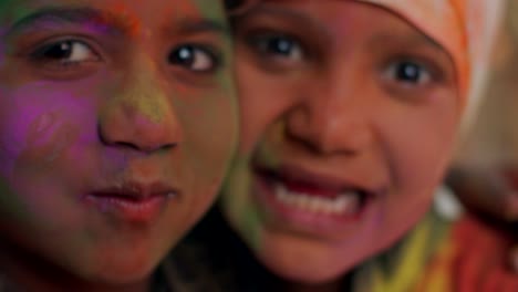 kids celebrating the hindu festival of holi in rajasthan, india