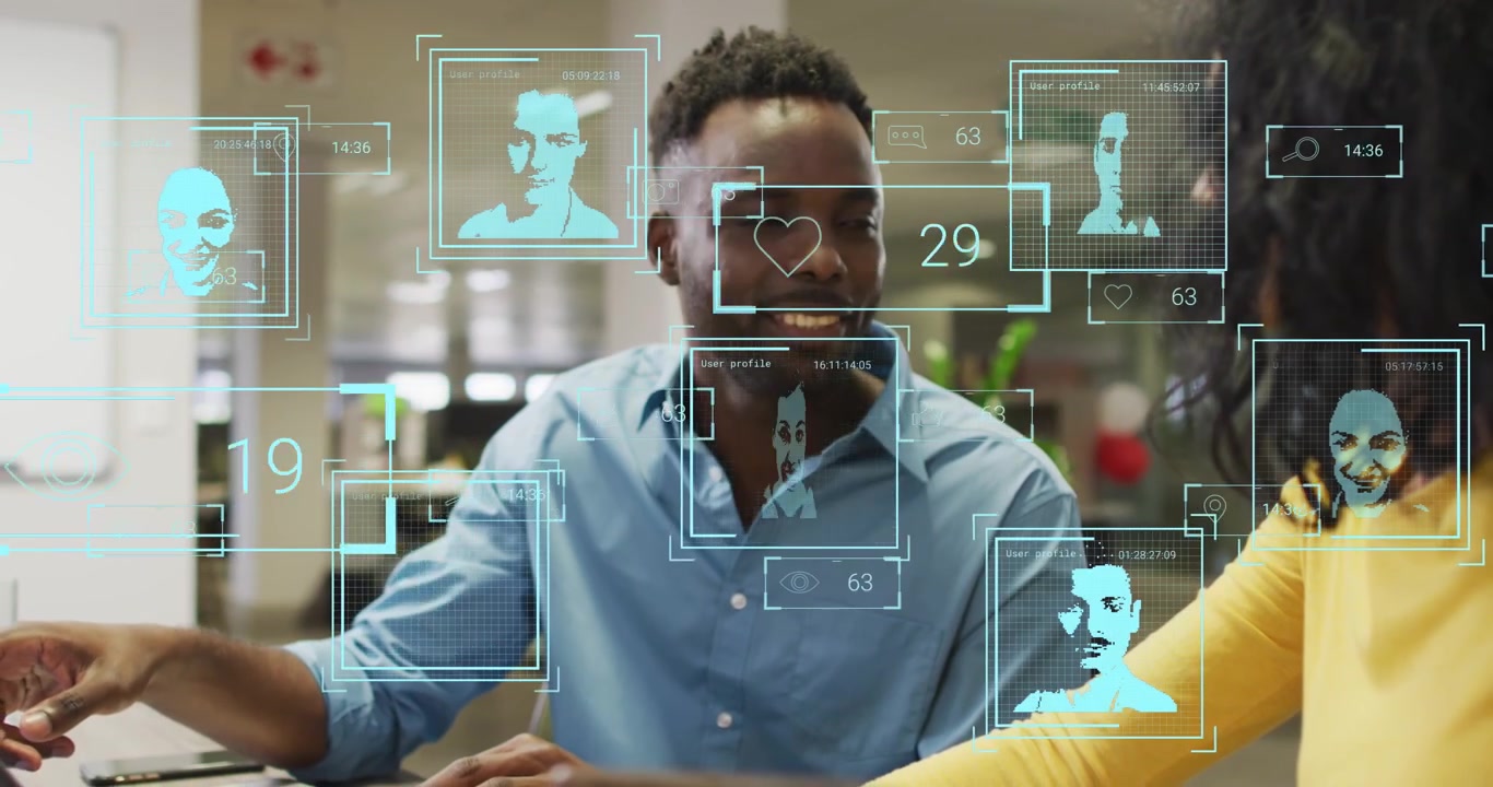 Animation of people icons over diverse business people in office