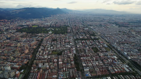 Aerial-Drone-Establishing-Shot-Of-Vast-Large-Latin-American-Flat-Cityscape-During-Afternoon-Daylight