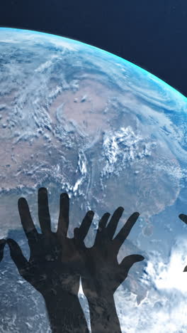 animation of hands shadows over globe in cosmos