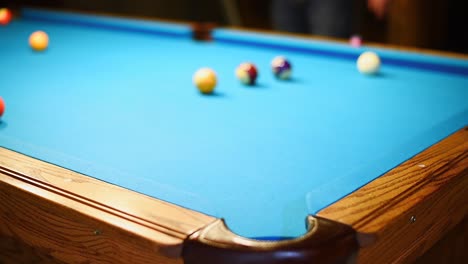 billiards jump shot over other balls to pocket the 8-ball in the corner pocket