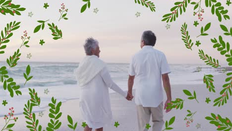 animation of leaves over senior biracial couple at beach