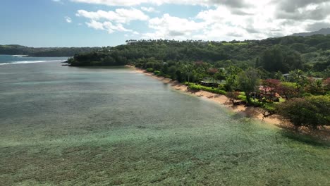 High-Altitude-aerial-shot-flying-over-Anini-beach,-Kauai,-Hawaii