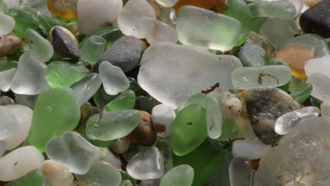 colorful sea glass and pebbles on the beach