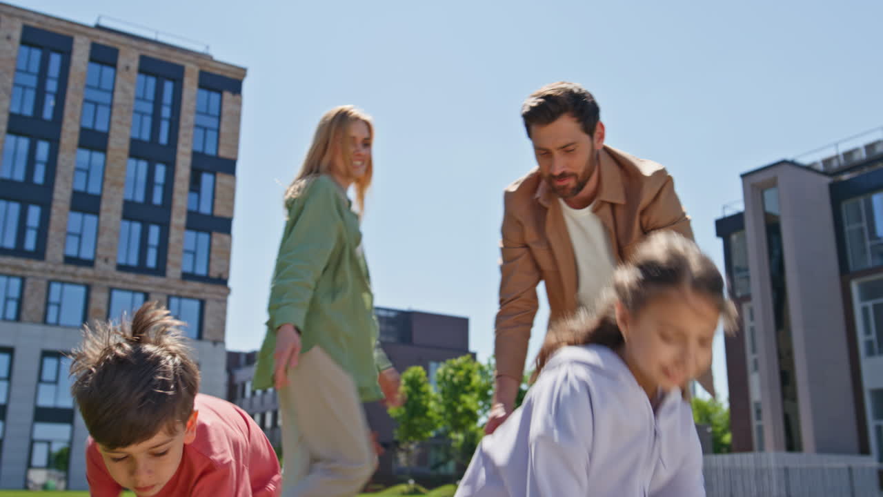 Woman putting picnic blanket grass closeup. Family preparing eating on fresh air