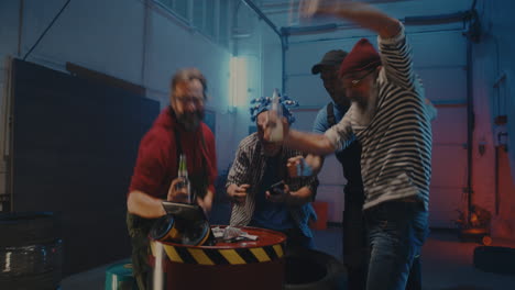 friends celebrating a win in a garage