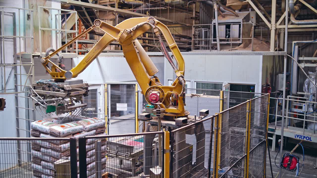Industrial background with robotic equipment. Factory robot machine. Manufacturing production. Futuristic technologies.