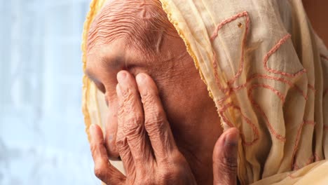 Senior-women-suffering-eye-pain-top-view