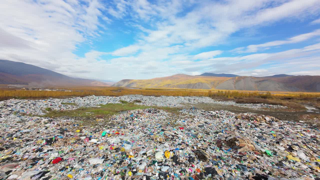 This location reveals the stark contrast between the natural beauty of mountains and the overwhelming presence of household waste