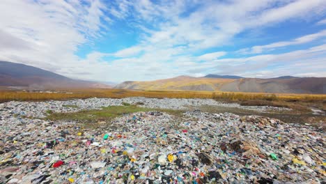 this location reveals the stark contrast between the natural beauty of mountains and the overwhelming presence of household waste