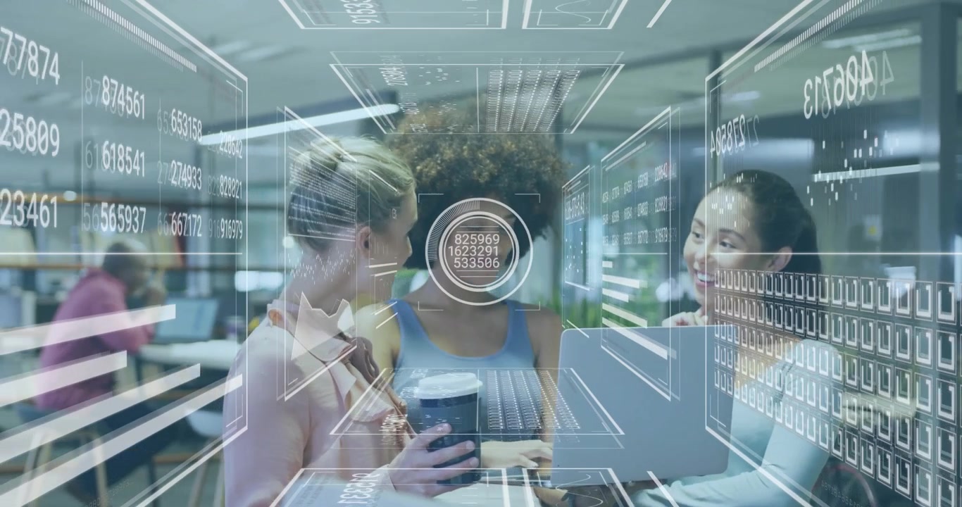 Three women collaborating on laptop in office as data HUD activating streaming analytics for review