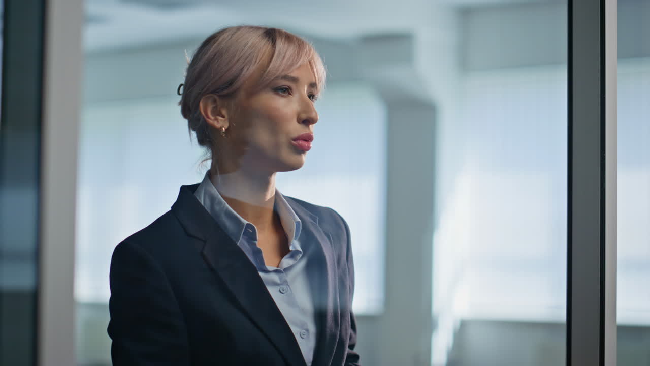 Worried lady looking smartphone working office closeup. Nervous blonde manager