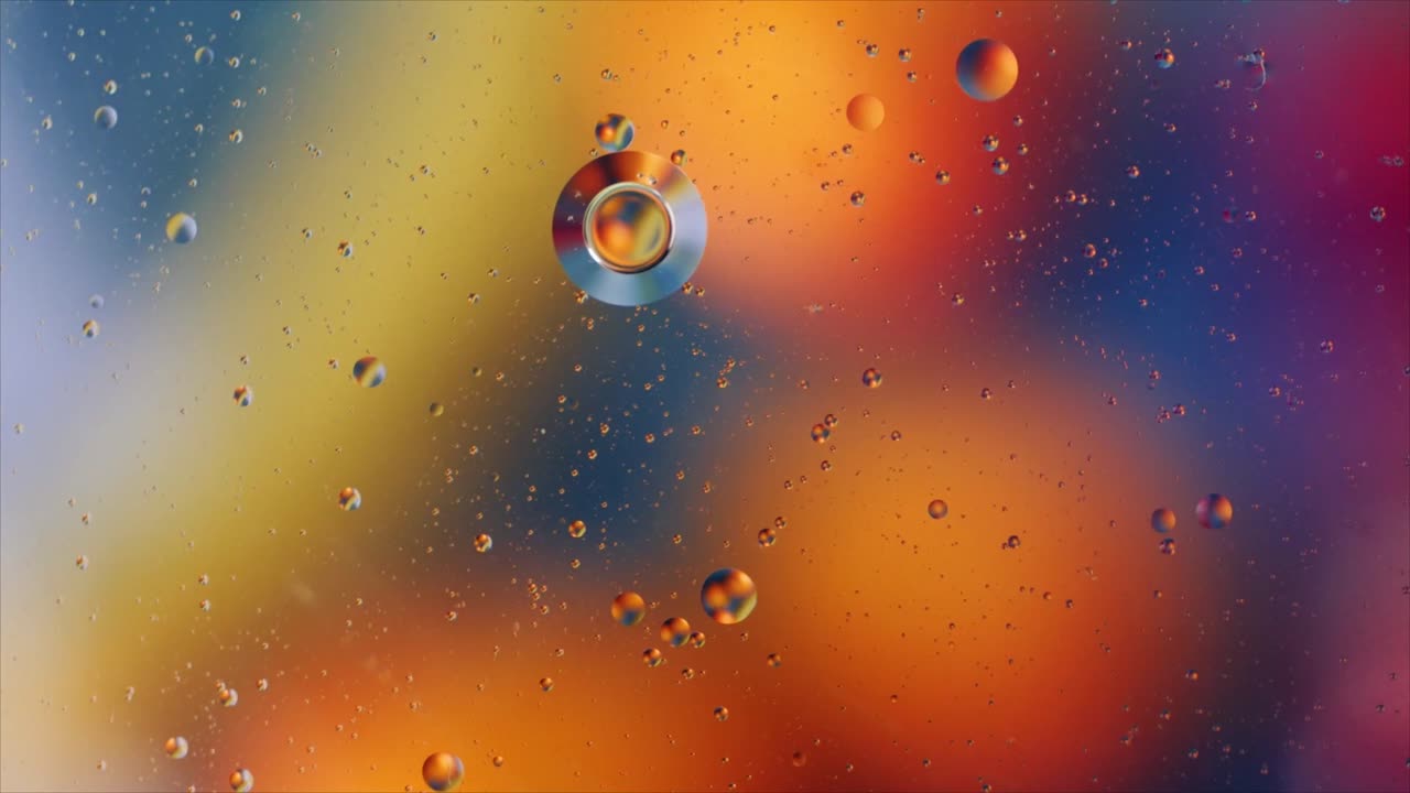 Bolhas Vibrantes e Abstratas de Óleo e Água Flutuando em Líquido