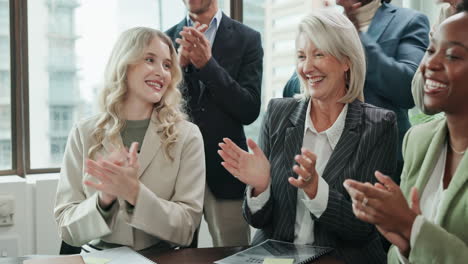 business team celebrating success with applause