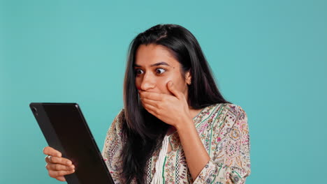 Cheerful-woman-gossiping-with-friends-during-videoconference