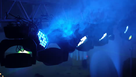 spotlights on stage with smoke. stage light with colored spotlights and smoke
